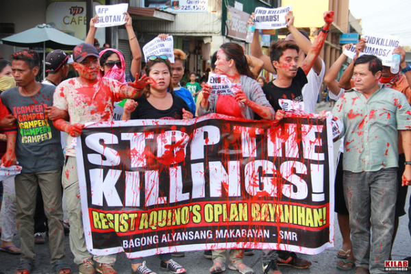 'STOP THE KILLINGS.' Protesters march in Davao City in September 2015, demanding that President Benigno Aquino III order the pullout of military and paramilitary groups from Lumad communities. File photo by Kilab Multimedia