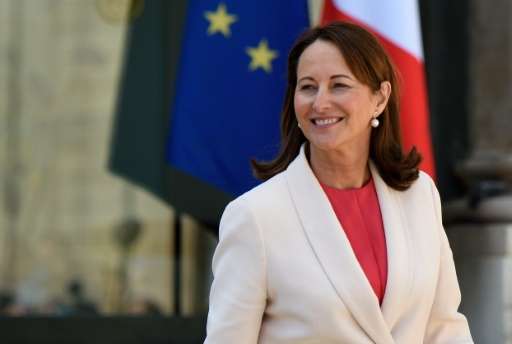 French Minister of the Environment, Energy and Marine Affairs Segolene Royal leaves after attending the council of ministers at the Elysee presidential palace in Paris on April 6, 2016