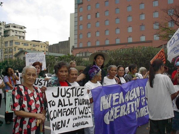M. Evelina Galang marches with the Lolas at an International Women’s Day protest in 2002.