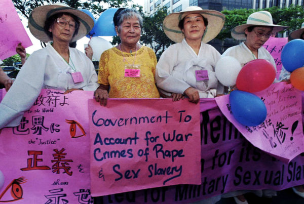 Rosa Maria Henson (second from left), from the Philippines, joins Korean “comfort women” Kim Soon Duk (left) and Yoong Sue Ree (second from right) during a protest rally staged in front of the Japanese embassy in Manila in 1996. Henson died a year later.