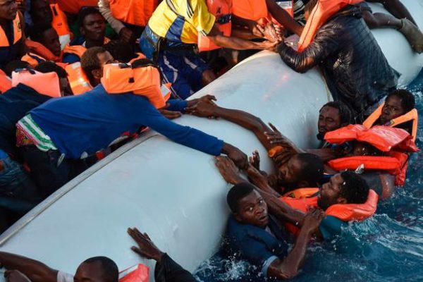 Desperate migrants are pulled from the sea off Libya