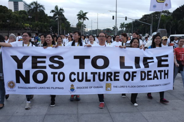 Priests, nuns, and seminarians join the 'Walk for Life' prayer rally to call for an end to drug-related killings and the proposed revival of capital punishment, in Manila on Feb. 18. (Photo by Maria Tan) 
