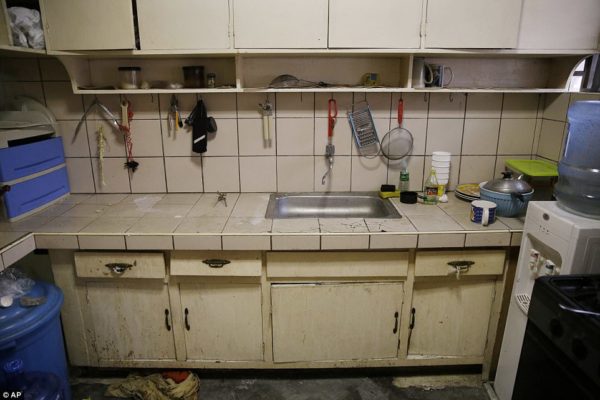 This picture shows the kitchen of the stuffy, two-bedroom townhouse in in Mabalacat in the Philippines