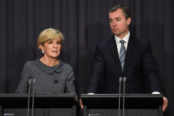 Julie Bishop, Australia’s foreign affairs minister, and Michael Keenan, Australia’s justice minister, spoke Tuesday about new legislation that would prohibit registered child sex offenders from leaving the country. Credit Lukas Coch/European Pressphoto Agency