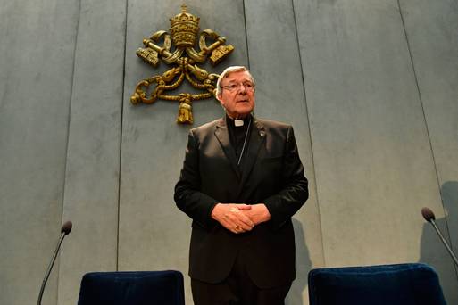 Australian Cardinal George Pell makes a statement at the Holy See press office in the Vatican city yesterday. Photo: Getty