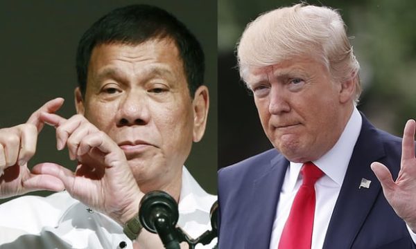 US president Donald Trump, right, has praised his Philippine counterpart, Rodrigo Duterte, left, for his ‘war on drugs’ that has left thousands dead. Photograph: Eugene Hoshiko, Pablo Martinez M/AP