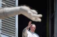 Pope Francis waves from a window overlooking an empty St. Peter’s Square on May 24. Bishops in the Philippines have been warned about a ‘dubious’ figure seeking donations by claiming to be close confidant of the Holy Father. (Photo: AFP)