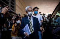 Chinese 'patriots' applaud as Hong Kong court convicts seven democracy advocates