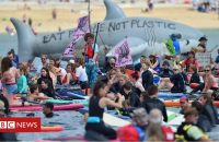 G7 in Cornwall: Environmental protesters take to streets and sea