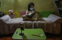Kylie Larrobis, an incoming first grade student, studies at her home in Quezon City, suburban Manila, ahead of another school year of remote lessons in the Philippines due to the pandemic. Photograph: Jam Sta Rosa/AFP/Getty Images