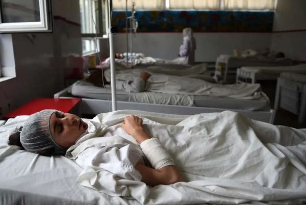 Afghan girls take university exams weeks after classroom attack