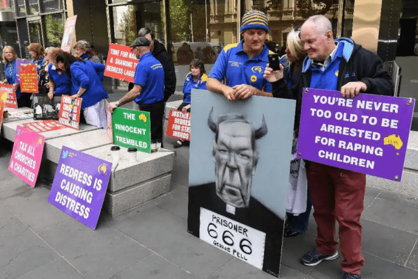 Former altar boy's father to press on with abuse case against Pell